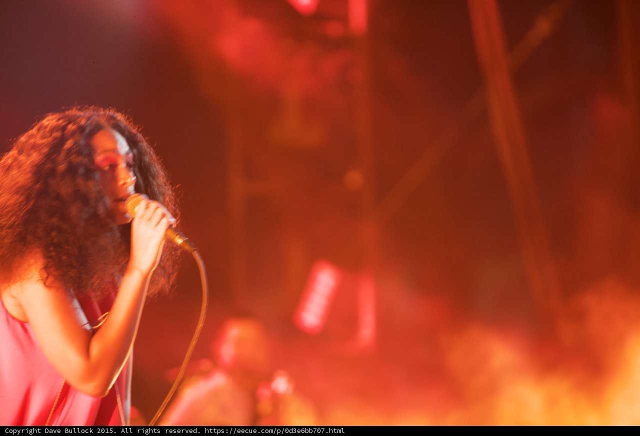Solange Profile Singing Band Member Red Orange Smoke Atmospheric