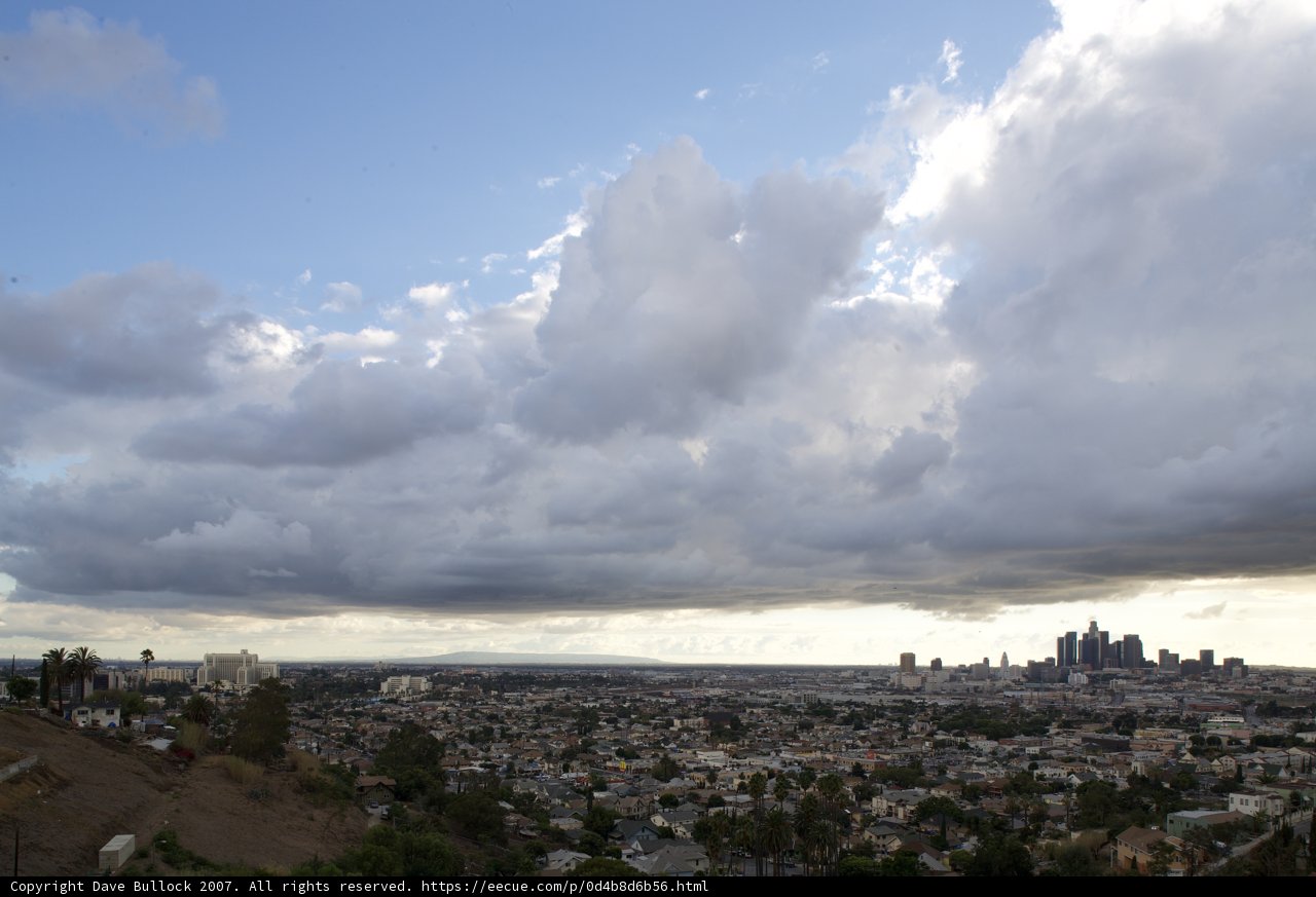 Moody Cumulus Clouds Over the City