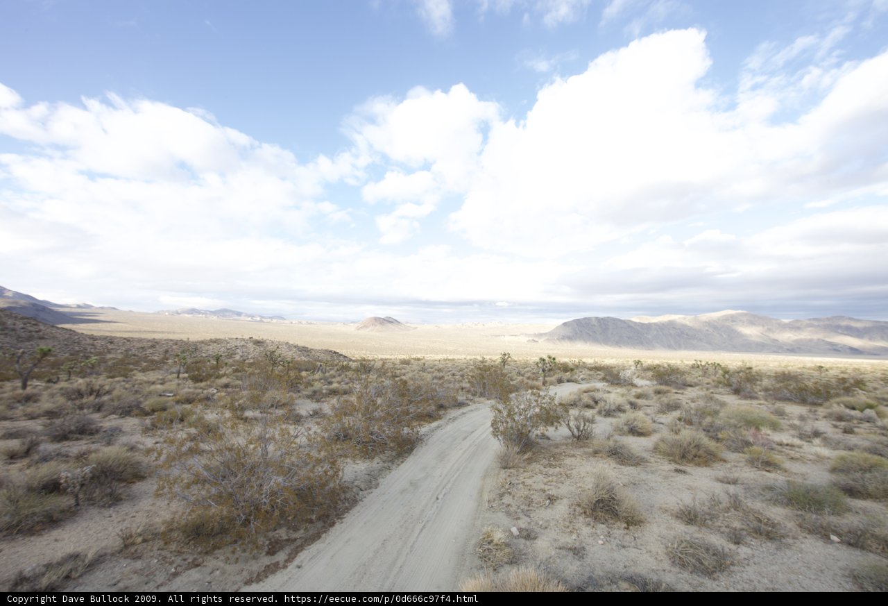 Desert Road with Scenic Sky
