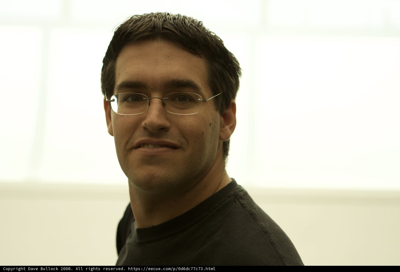 Portrait of a Happy Man with Glasses