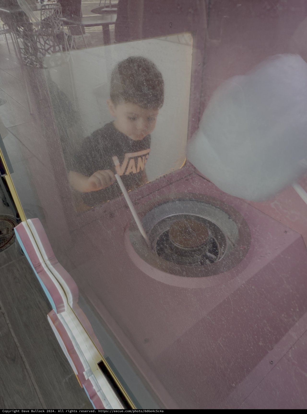 Child Conducting Interactive Science Experiment with Dust Cloud