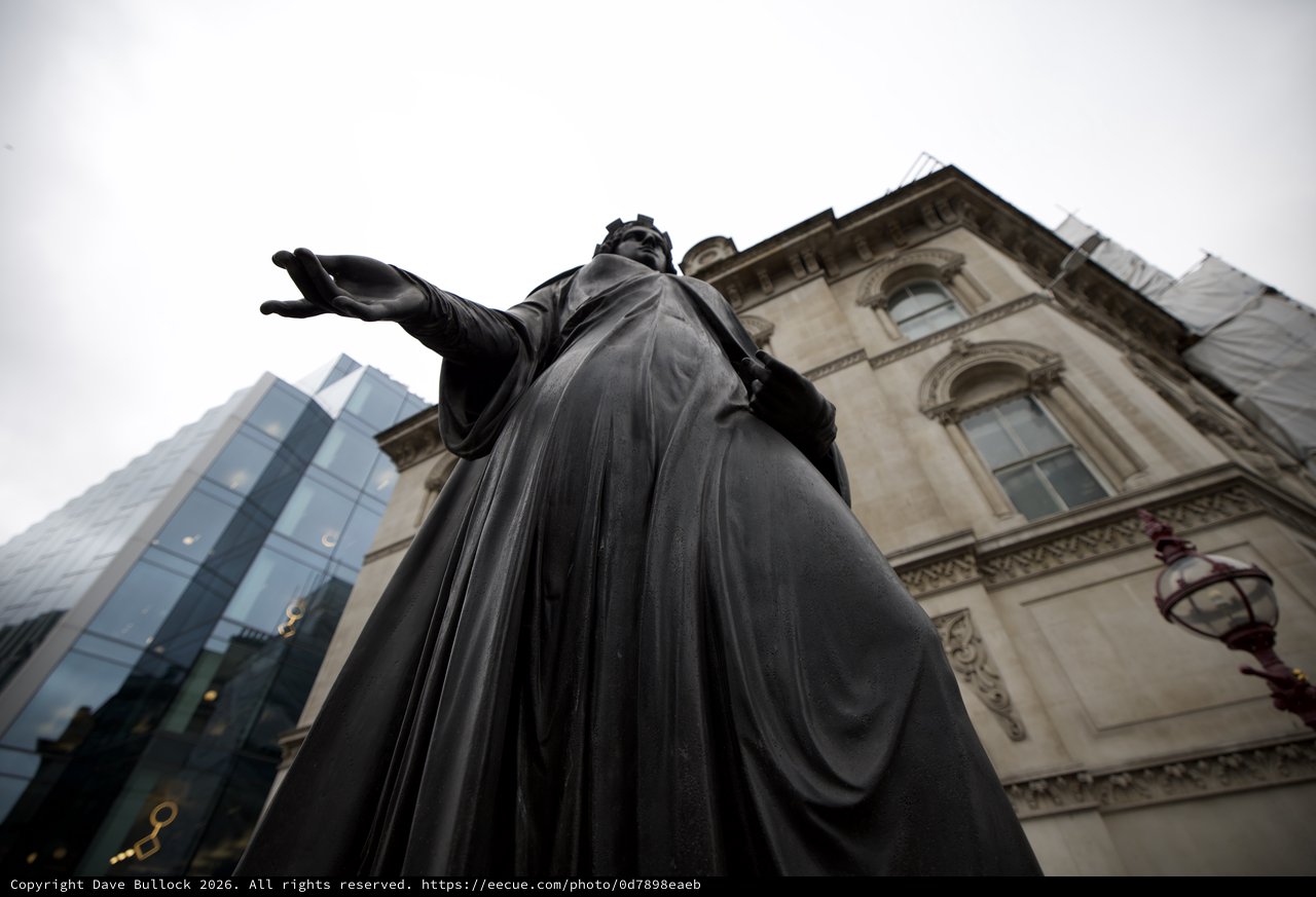 Monumental Bronze Statue Against Historic London Architecture