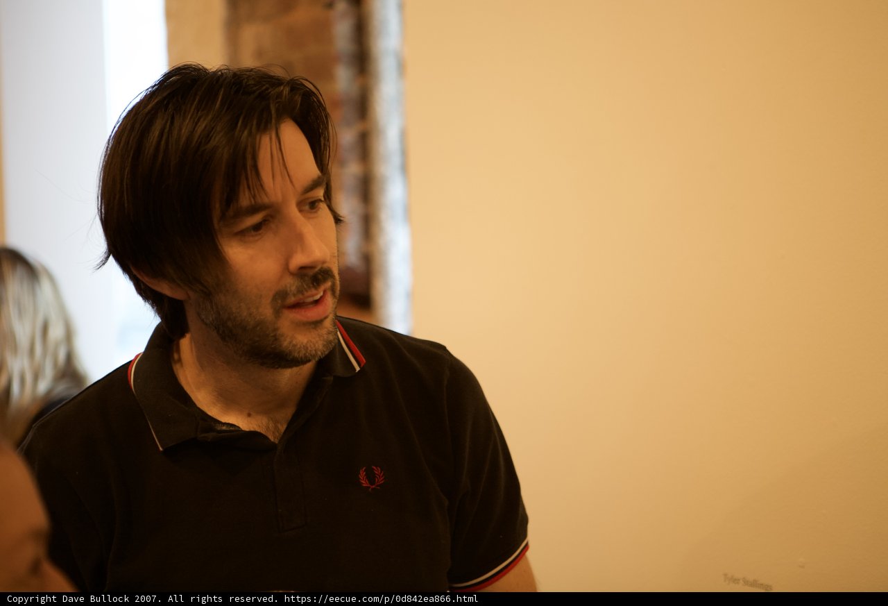 Man with a Beard in Black Polo Shirt