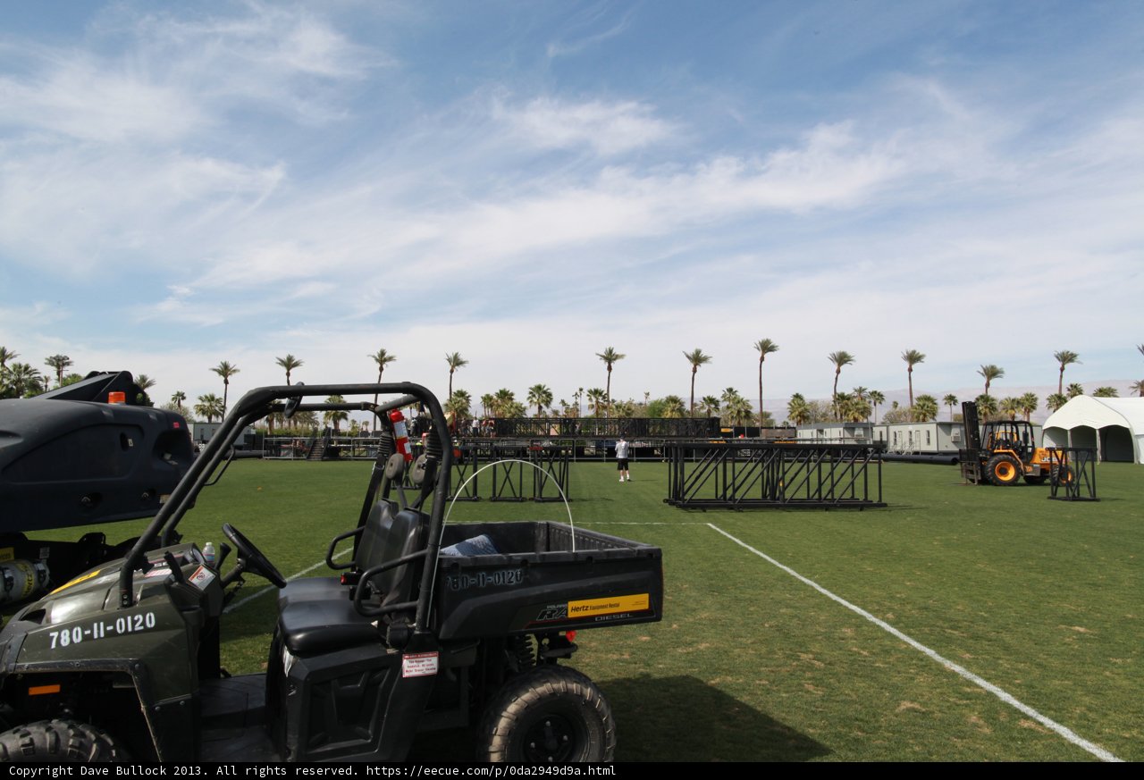 Parked Golf Cart on a Green Field