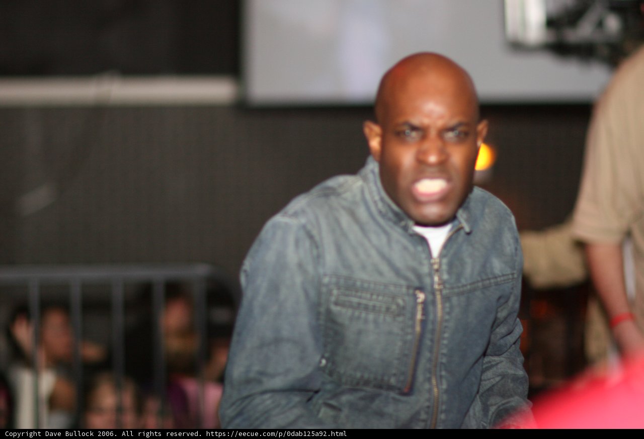 Man in Black Jacket in a Pub