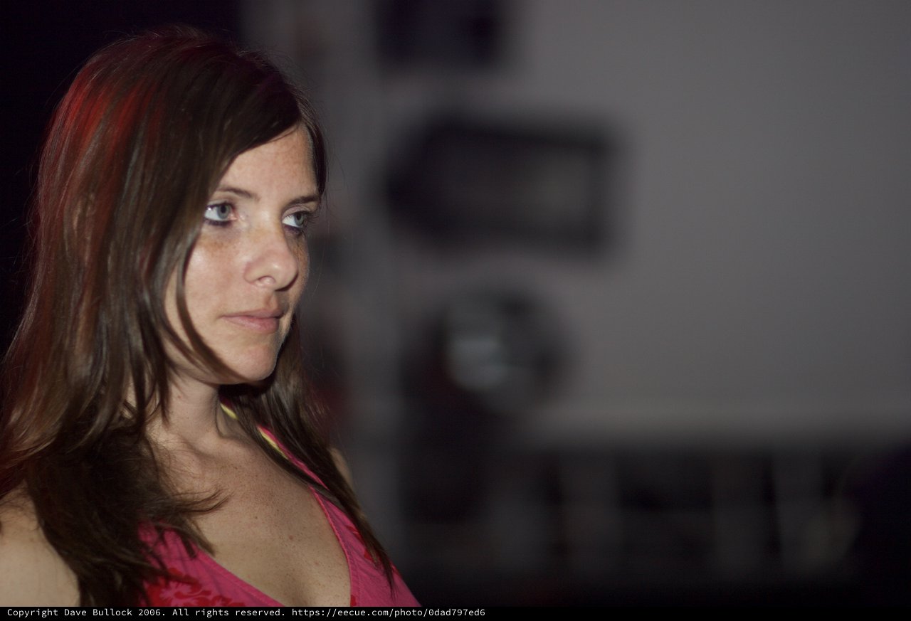 Contemplative Woman in Dramatic Low-Key Portrait