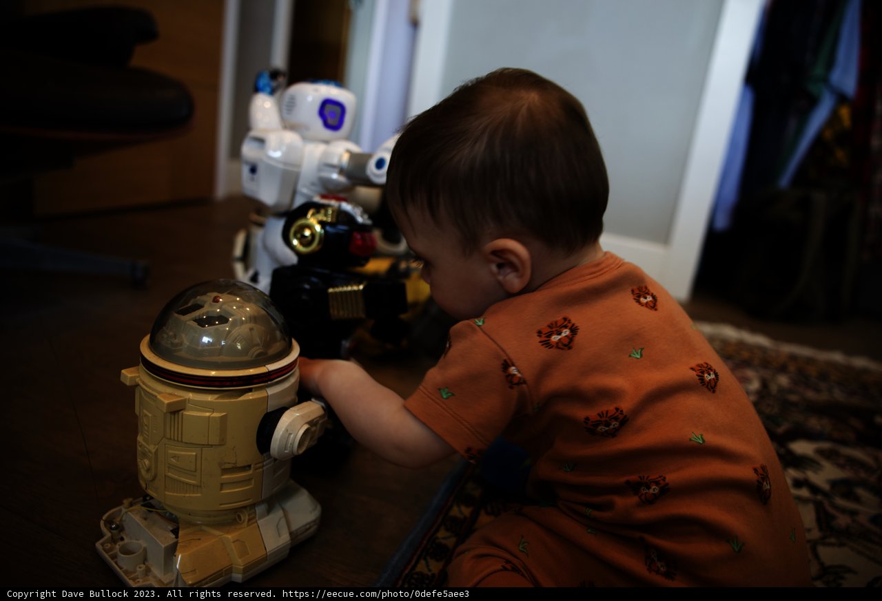 Adorable Baby Discovers the World of Robotics