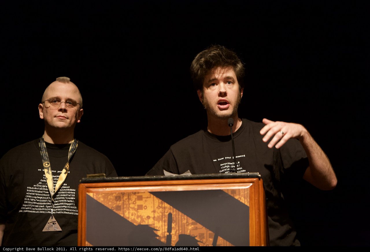 Two Men Deliver Speech at DefCon Conference