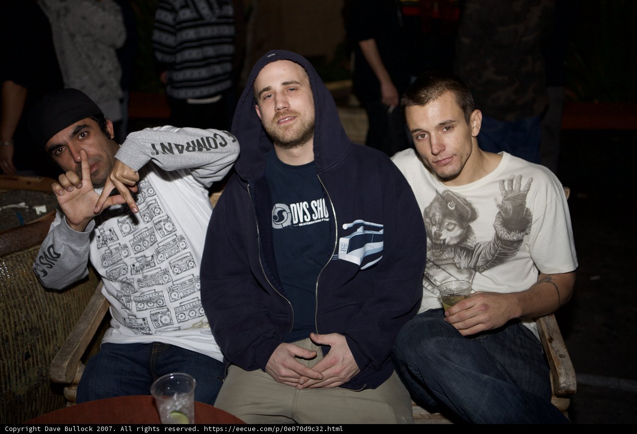 Three Men Take a Break outside Funktion Club