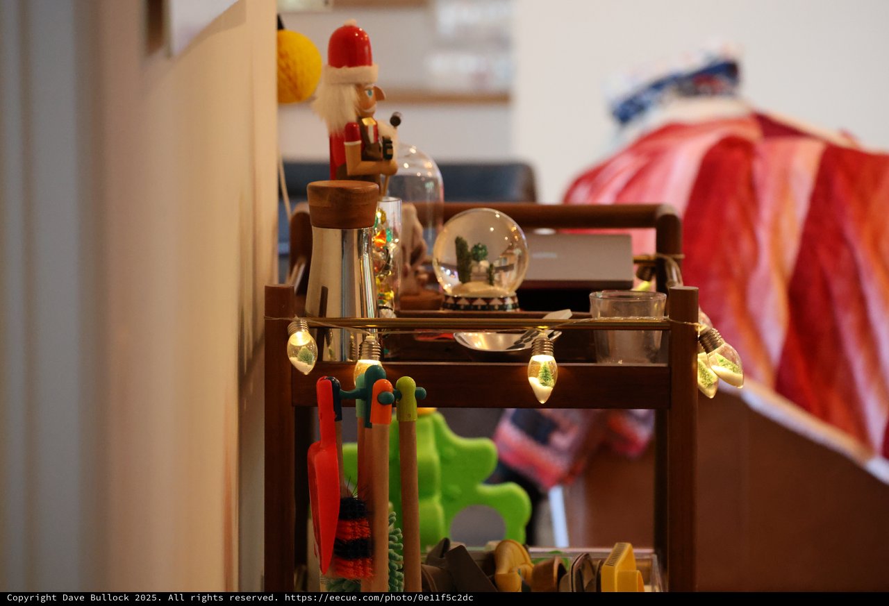 Festive Holiday Display on Wooden Cart with Toys