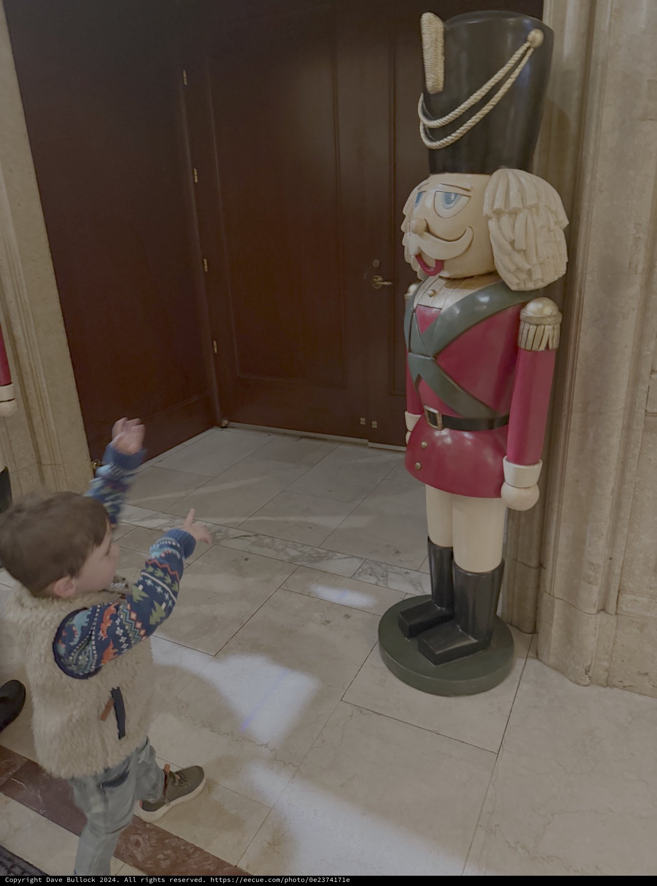 Child Meets Giant Holiday Nutcracker Display