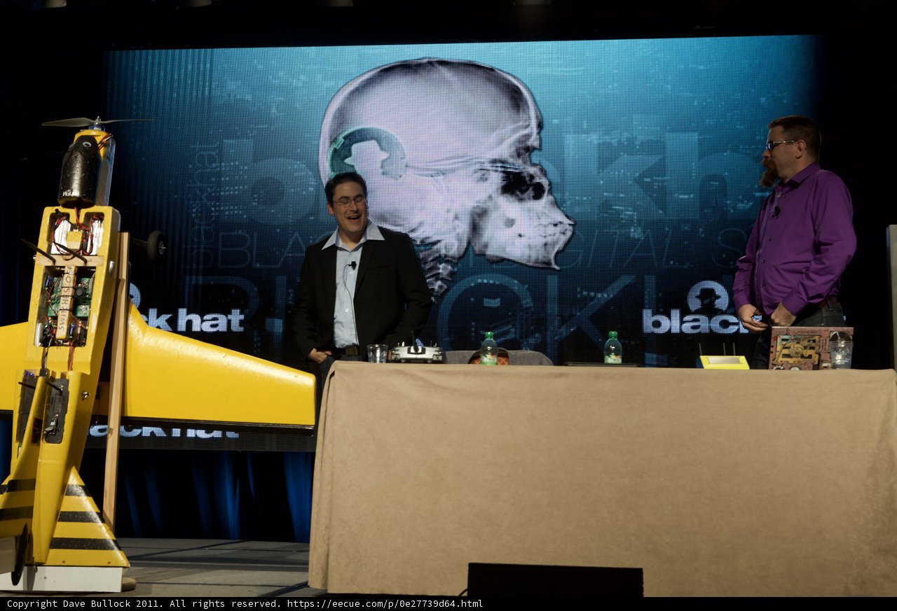 Men and Yellow Robot at DEFCON 2011