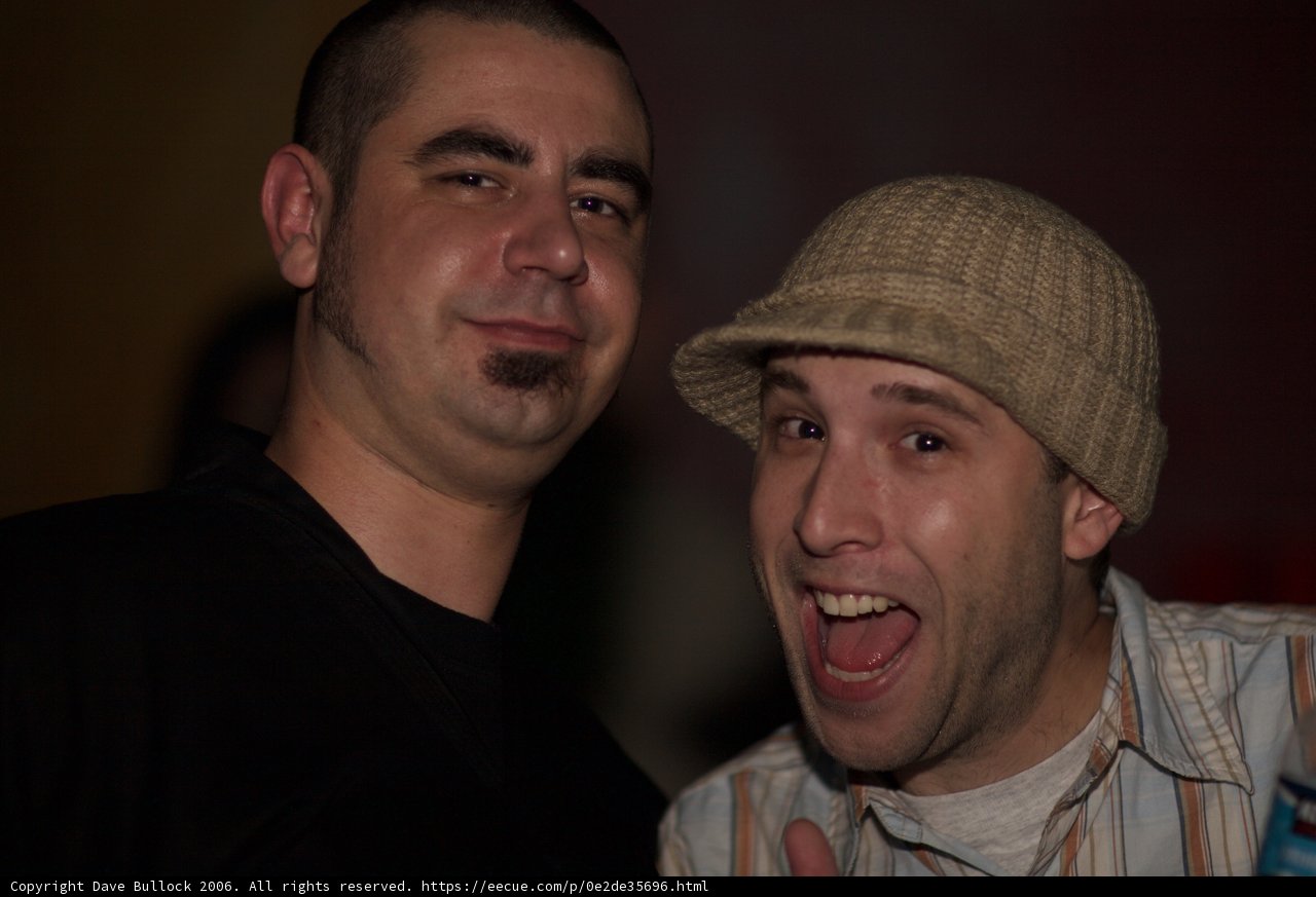 Smiling Men in Hats