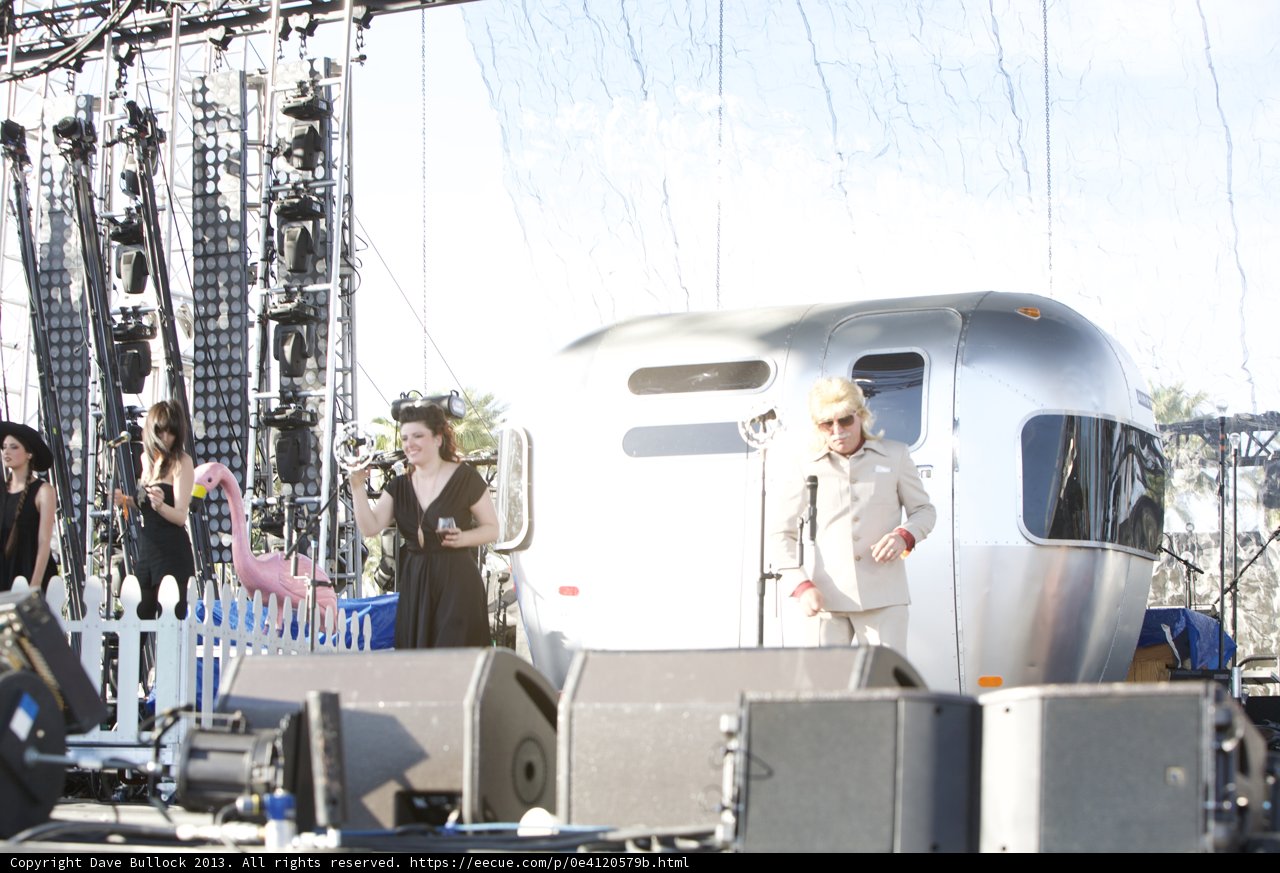 Carina Round on Stage with a Silver Trailer