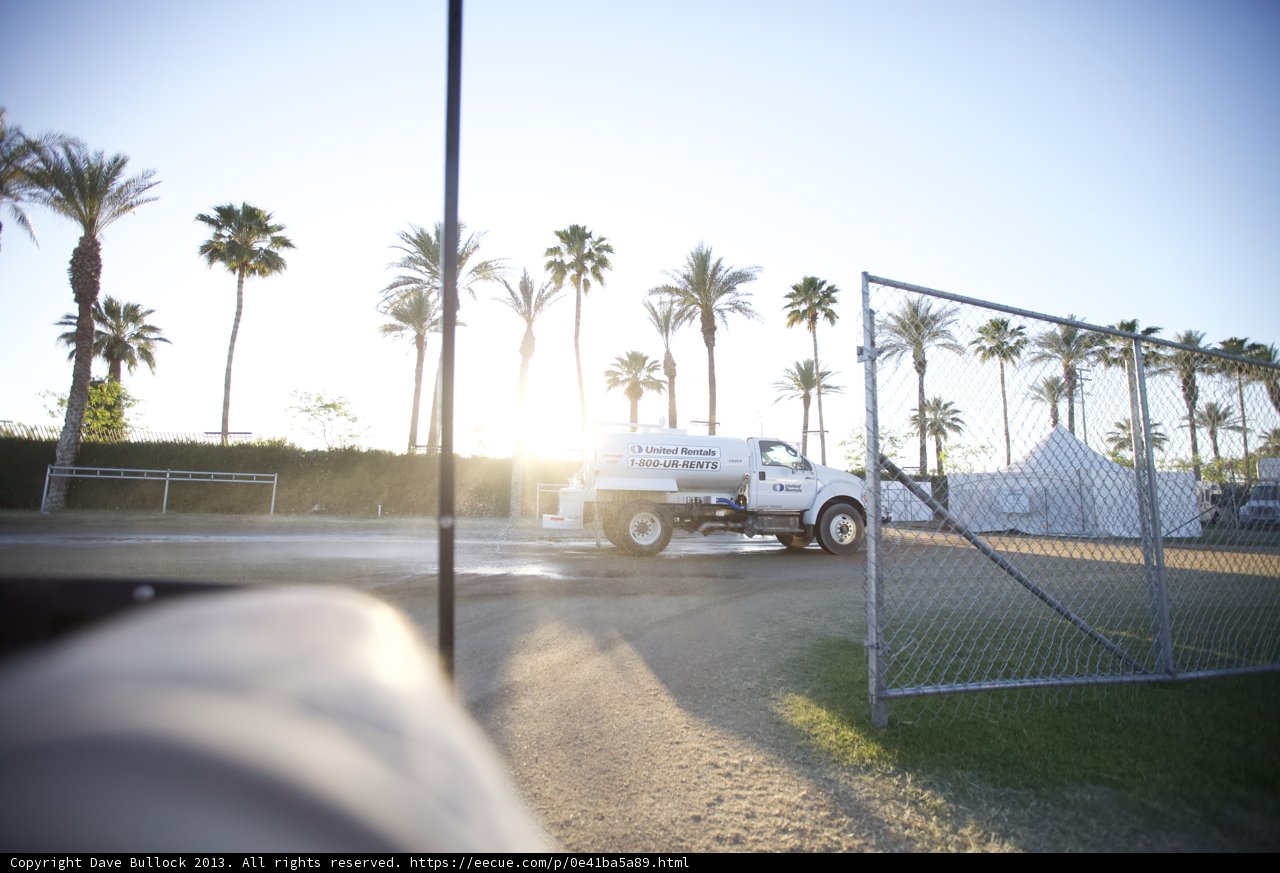 Parked Truck in Front of Fence