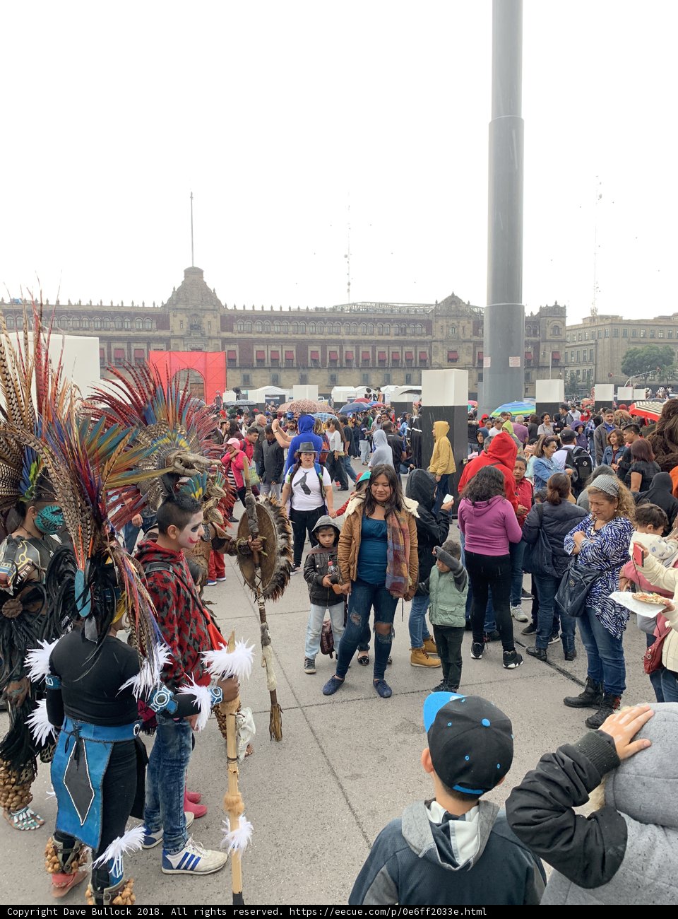 Festival Parade of People in Colorful and Intricate Headgear