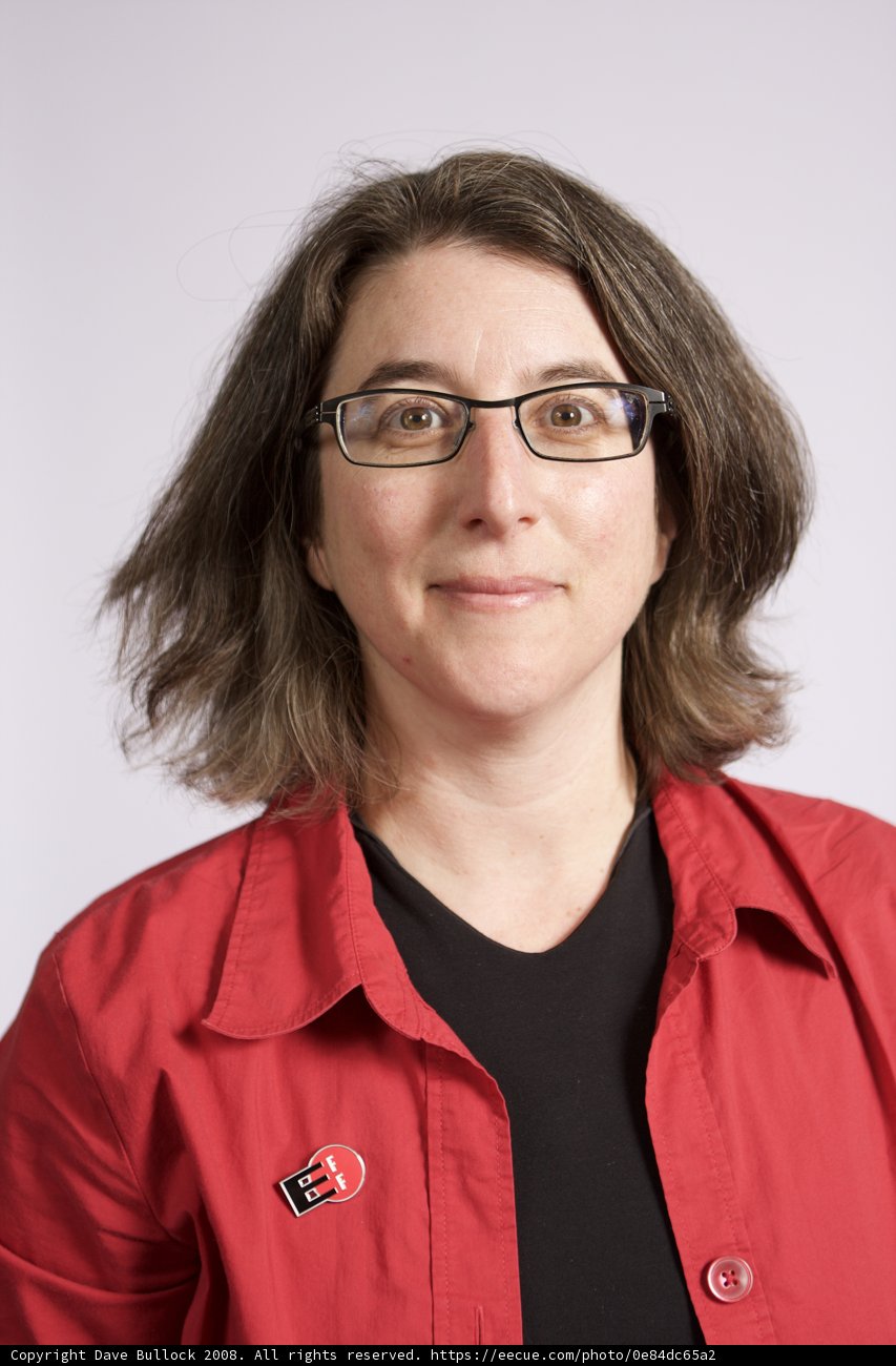 Cindy Cohn in Red Jacket and Glasses