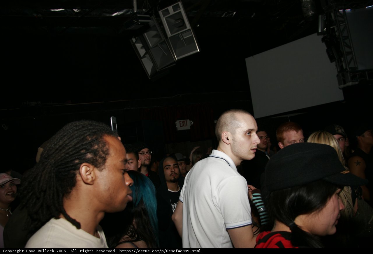 Dreadlocked Gentleman in a Crowded Nightclub