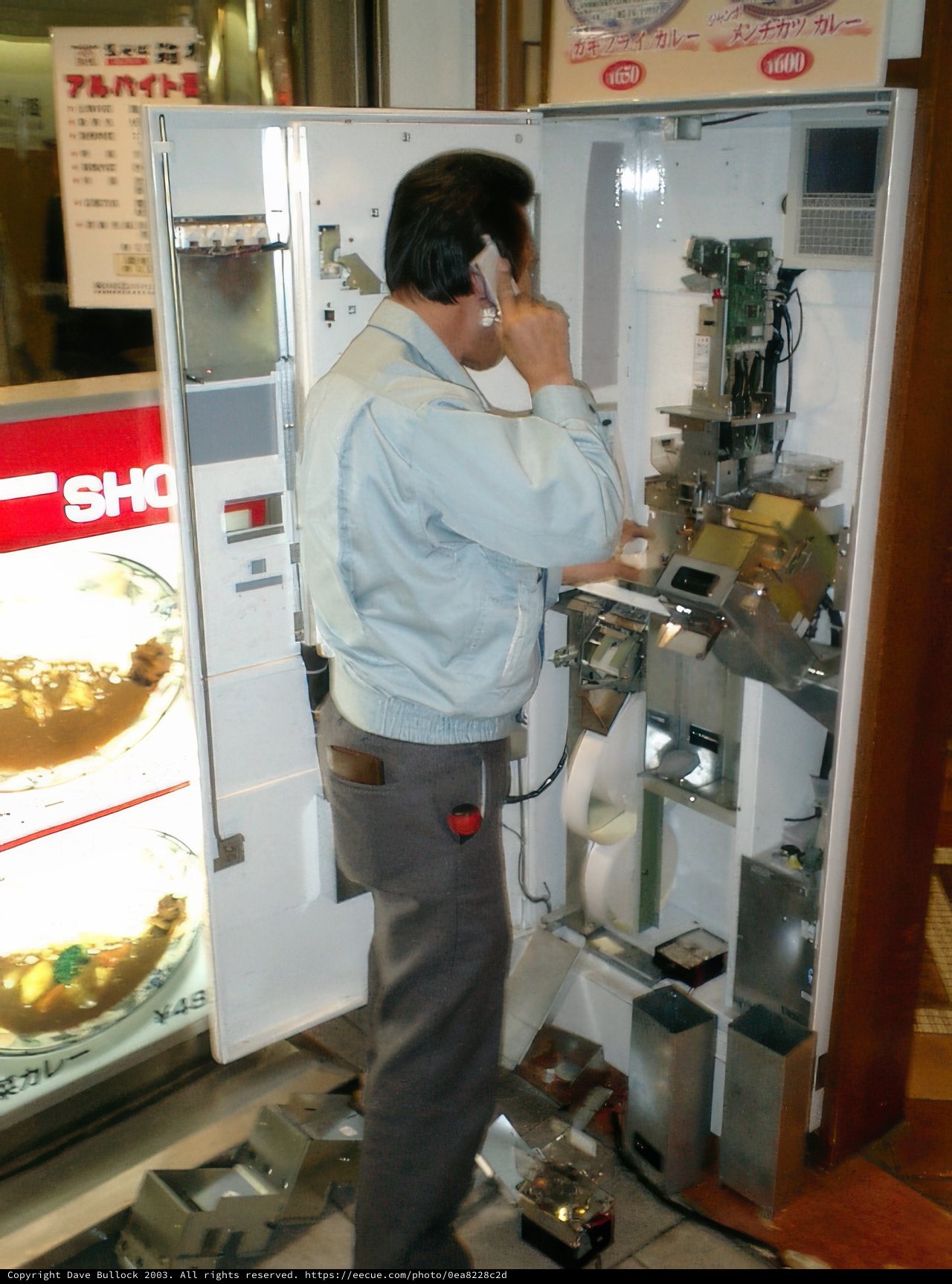 Man and Vending Machine in Tokyo