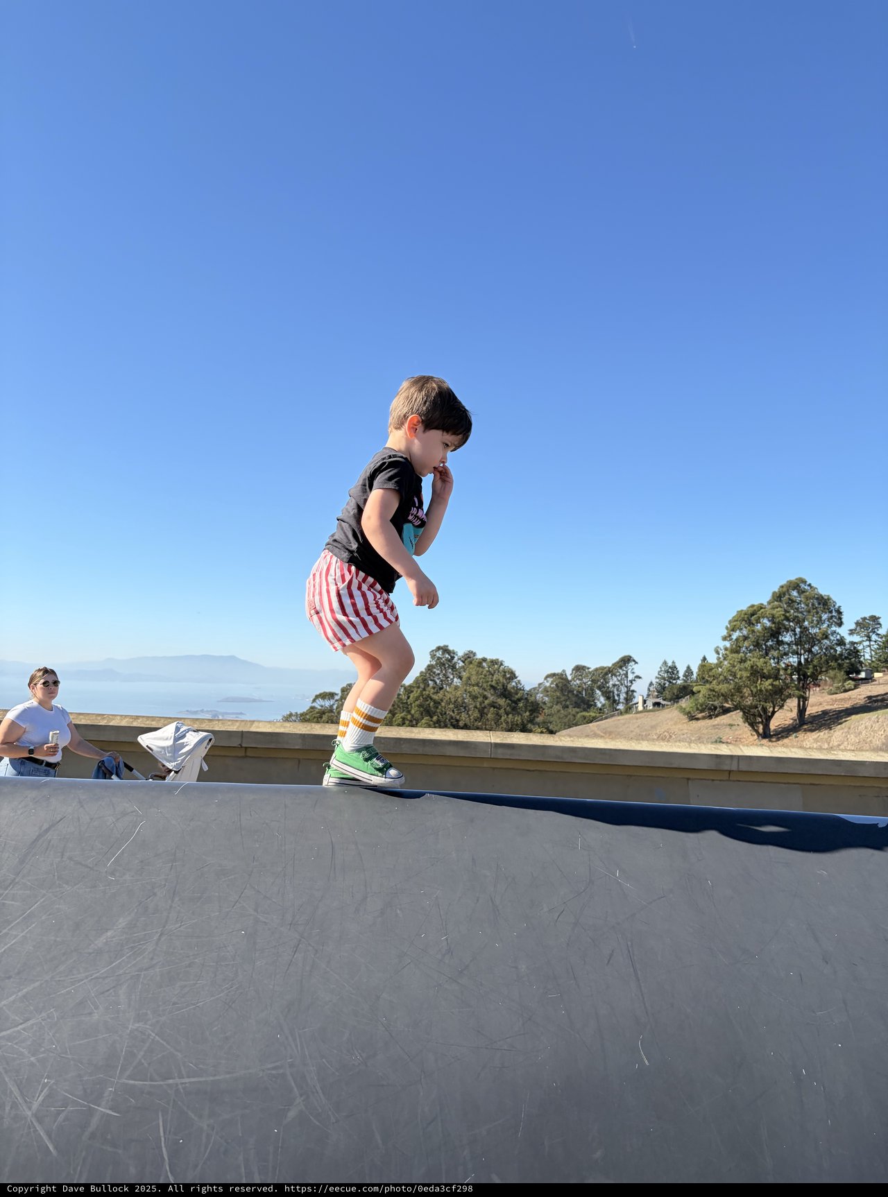 Young Boy Jumping on Outdoor Trampoline in California Hills
