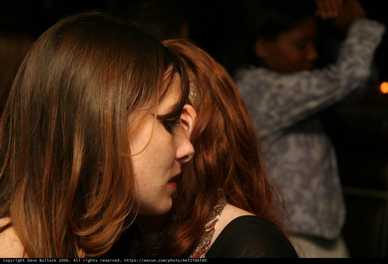 Penelope in Profile at a Dimly Lit Gathering