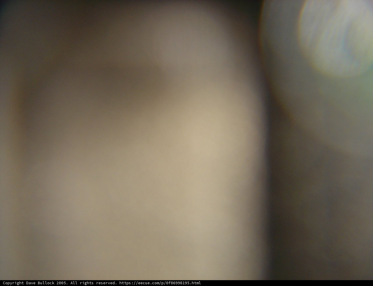 Blurry silhouette of a person under unique lighting
