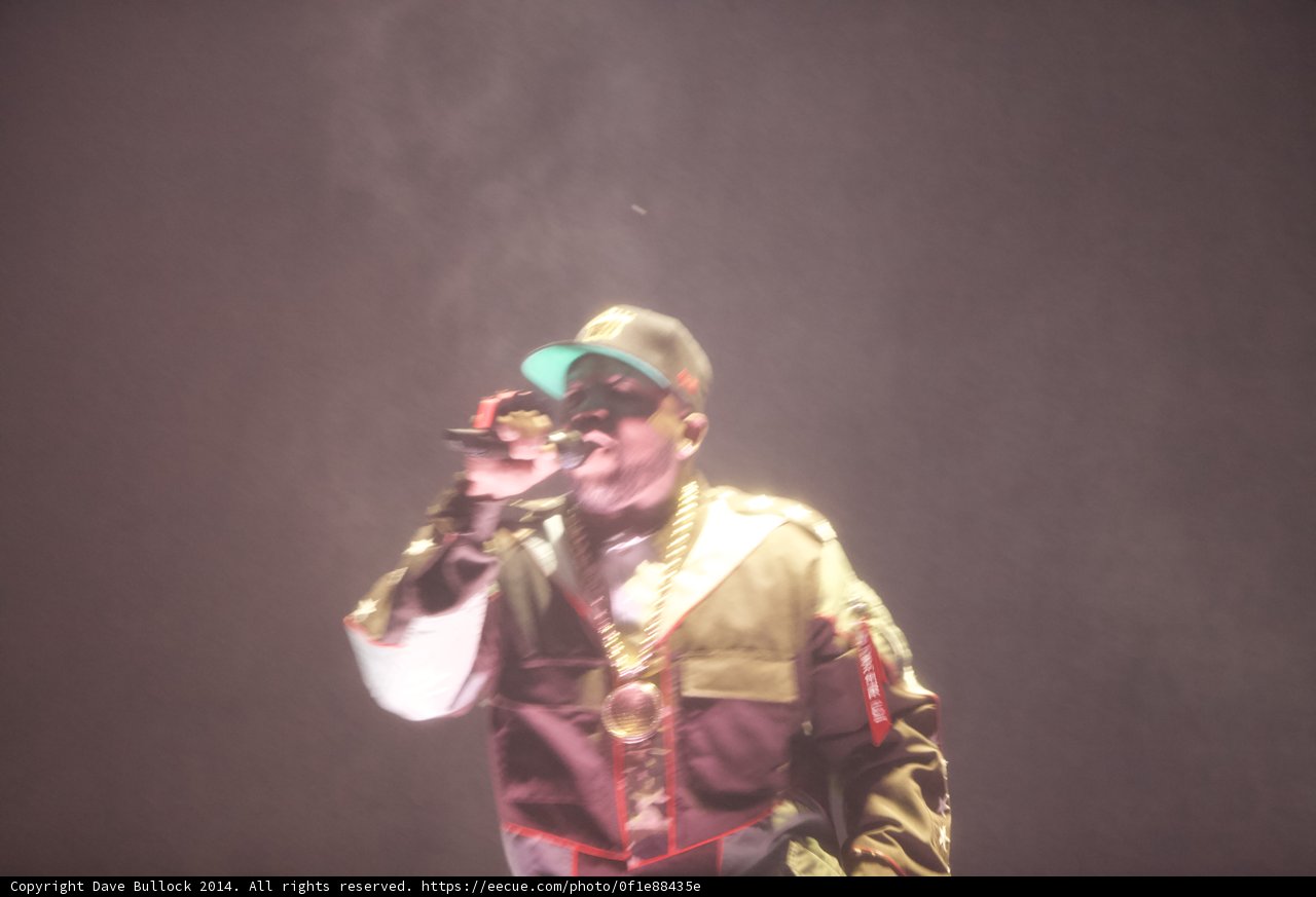 Man in Hat Takes the Stage