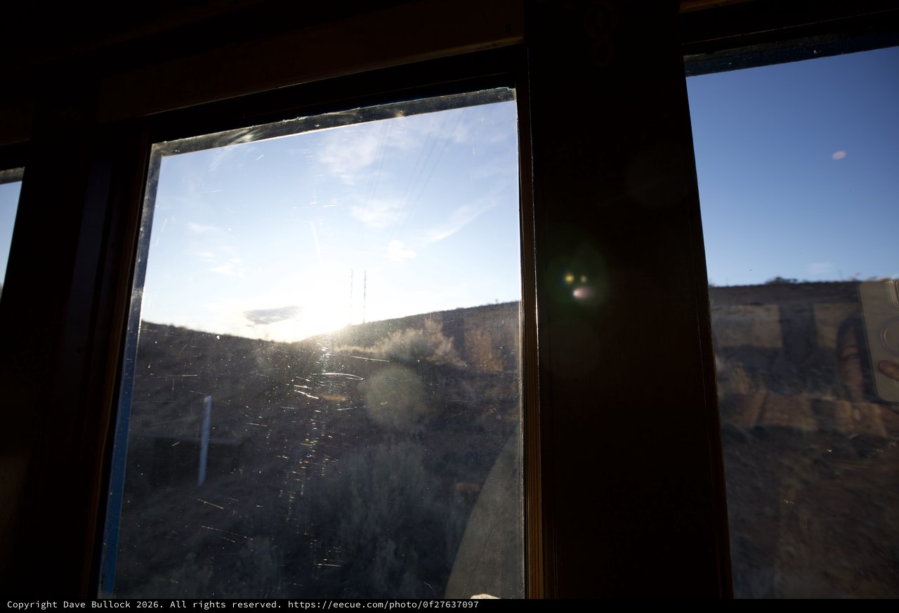 Sunset Through Dusty Windows in Abandoned Building