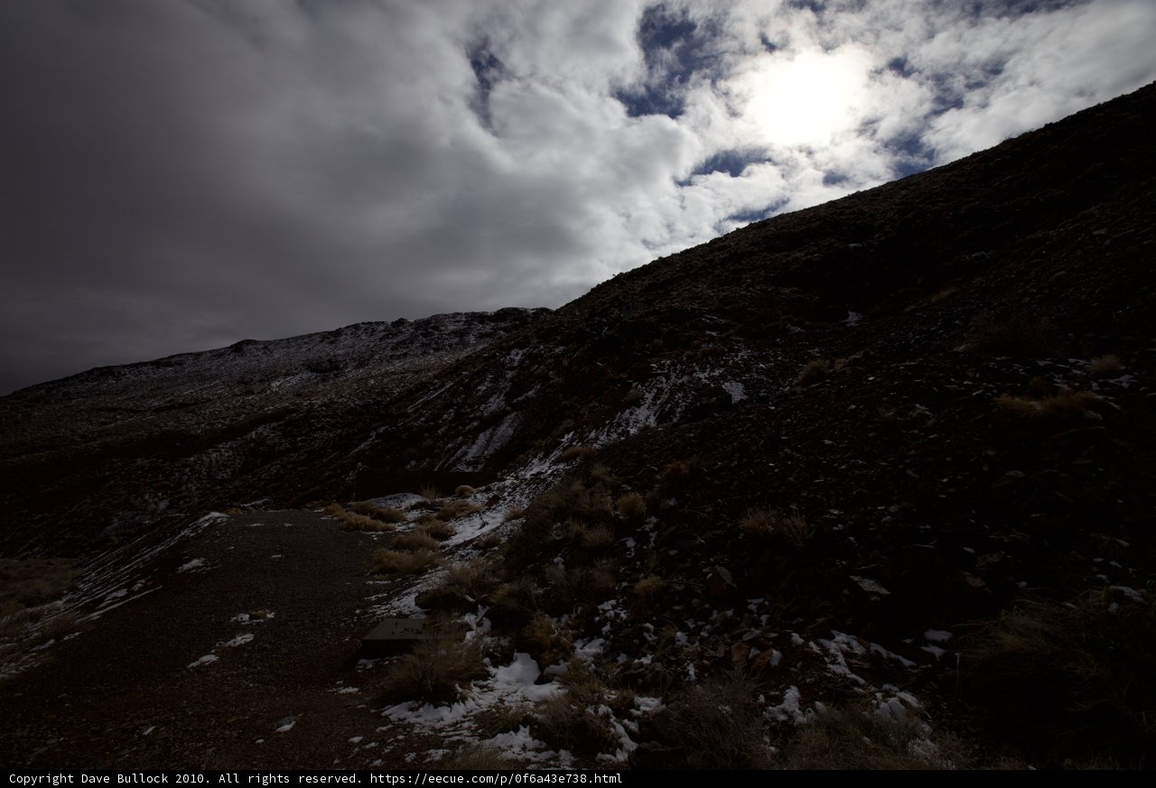Majestic Sun Flare over Mountain Range