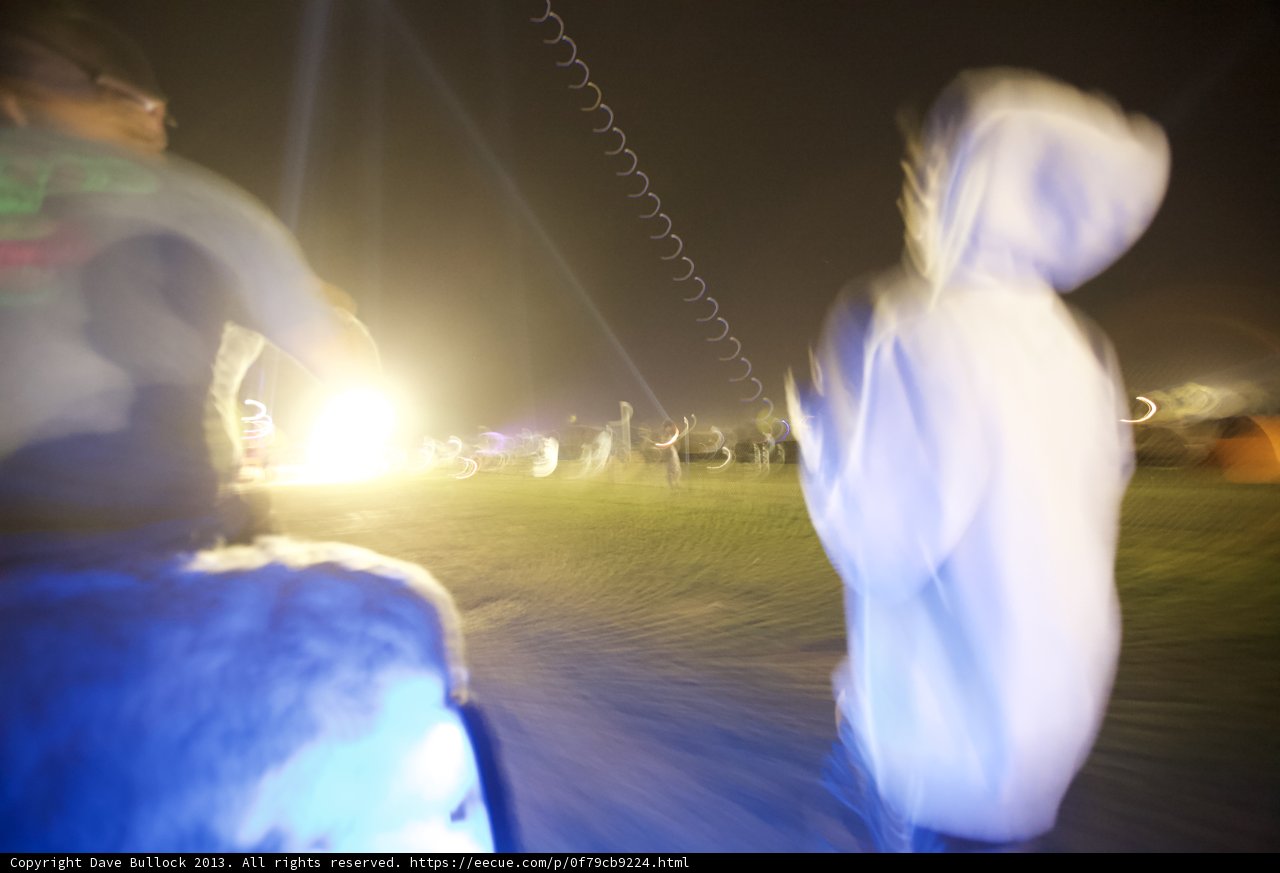 Blurry Silhouette in White Hoodie