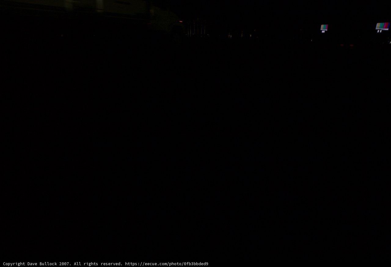 Silhouette of a Spider in the Urban Night