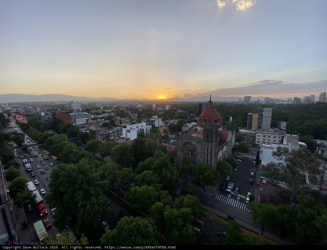 Sun sets over urban metropolis
