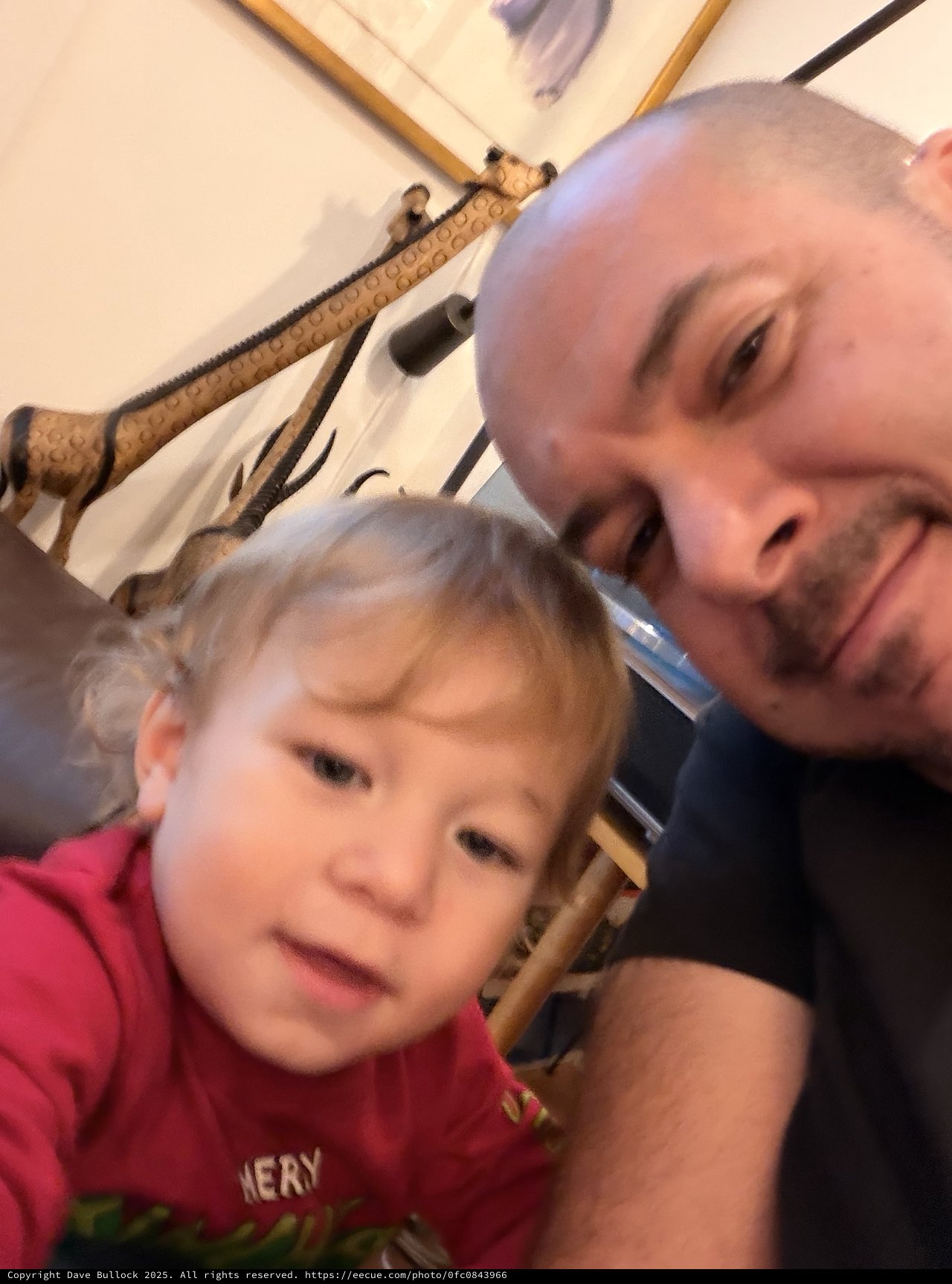 Father and Toddler Selfie at Home