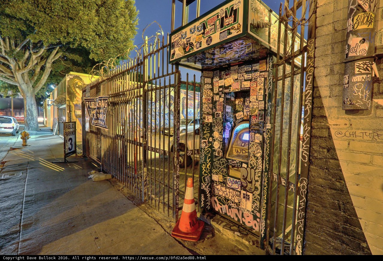 Graffiti on a Telephone Booth
