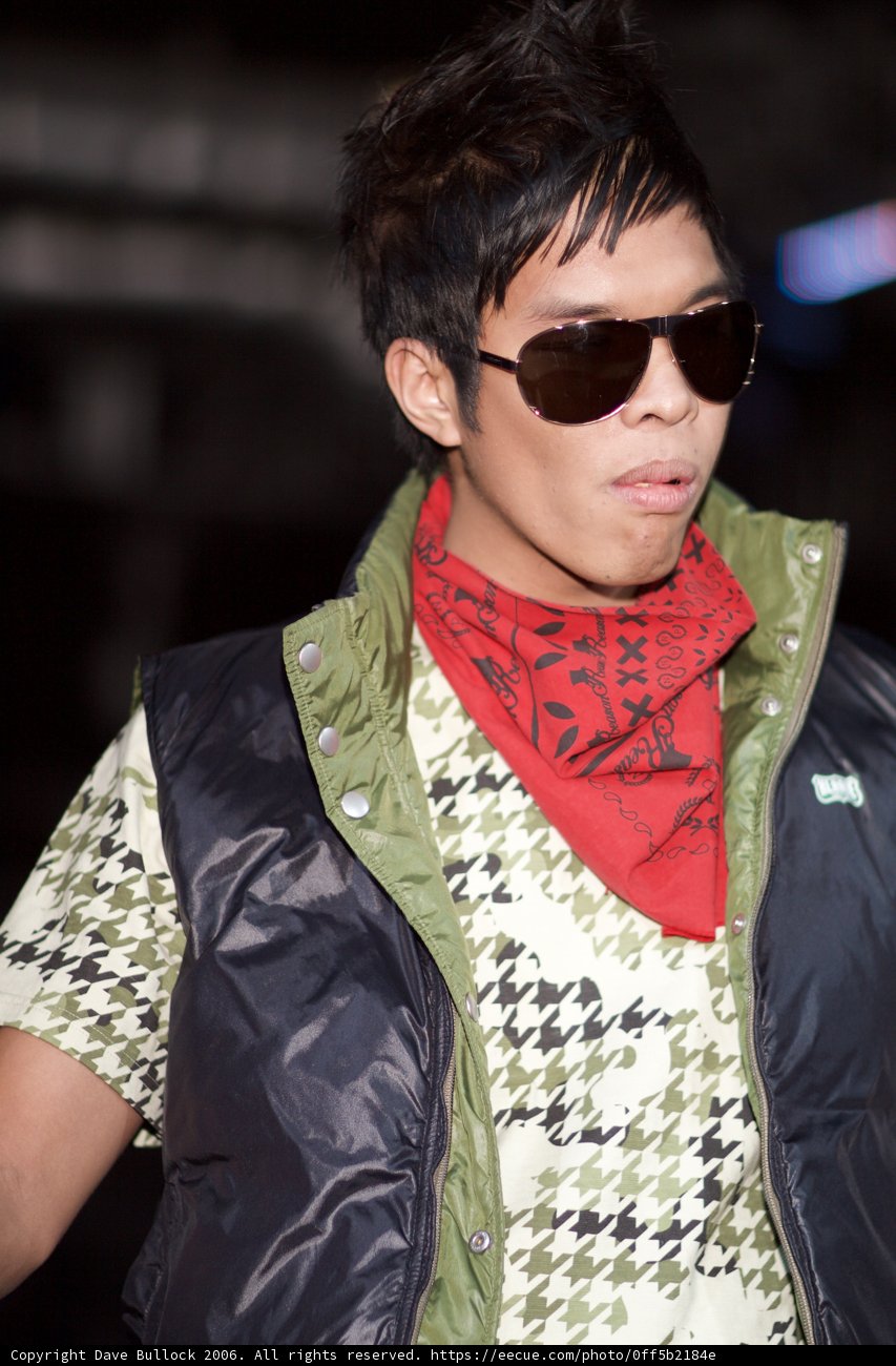 Stylish Man in Vest and Sunglasses