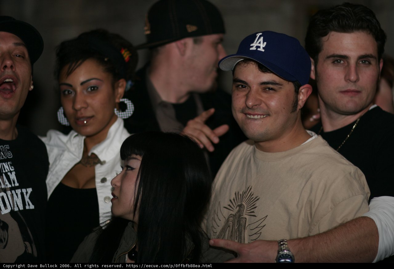 Man in a White Shirt at the Club