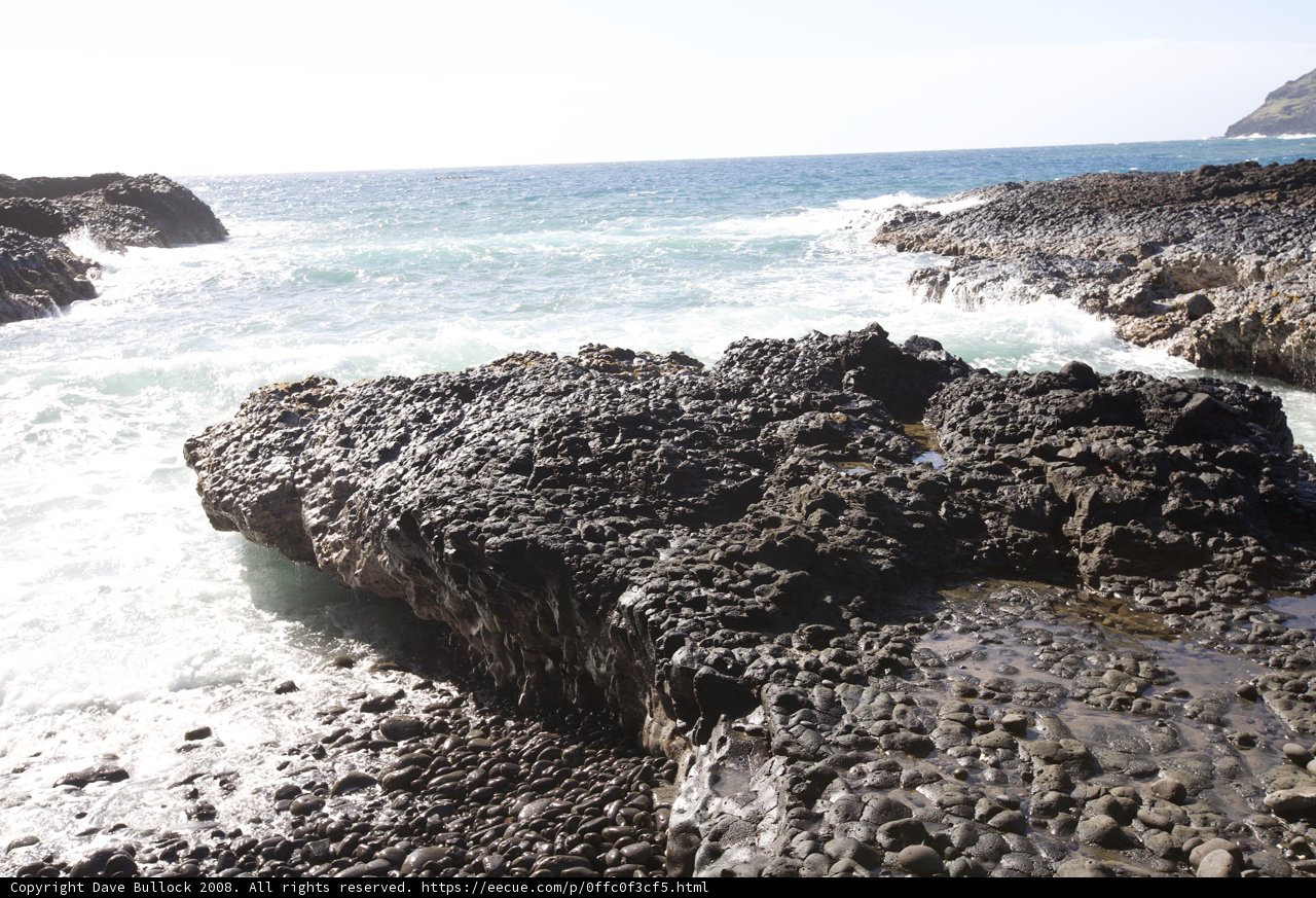 Majestic Cliff and Waves at the Shoreline