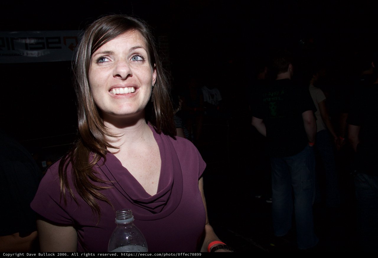 Woman Smiling at Live Concert Event 2006