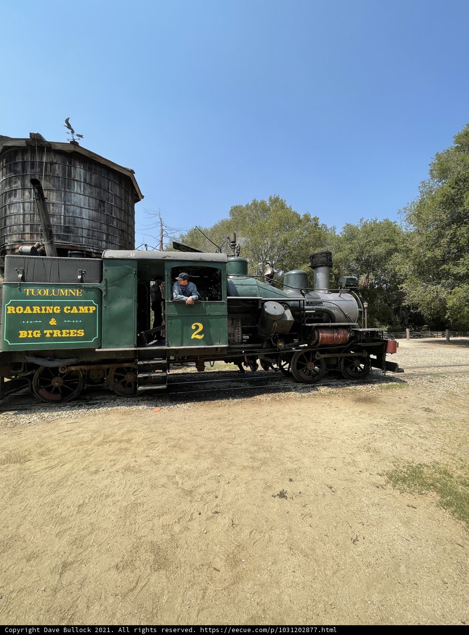 Green Locomotive Chugging Across the Felton Railroad