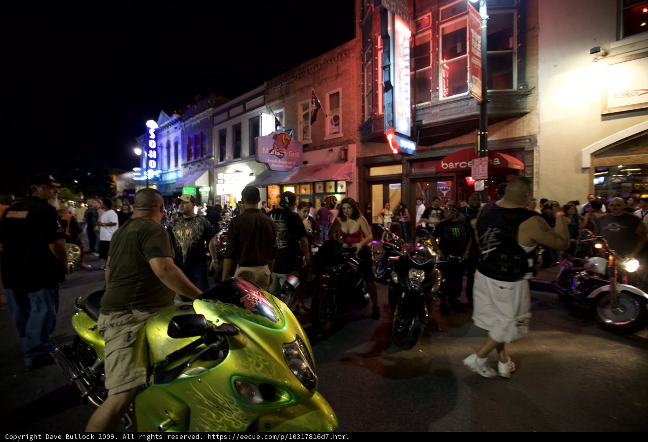 Group Gathering around Motorcycles