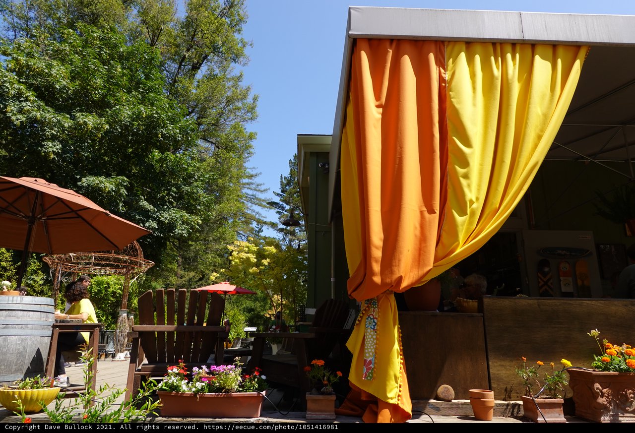 Colorful Outdoor Patio with Orange Yellow Curtains
