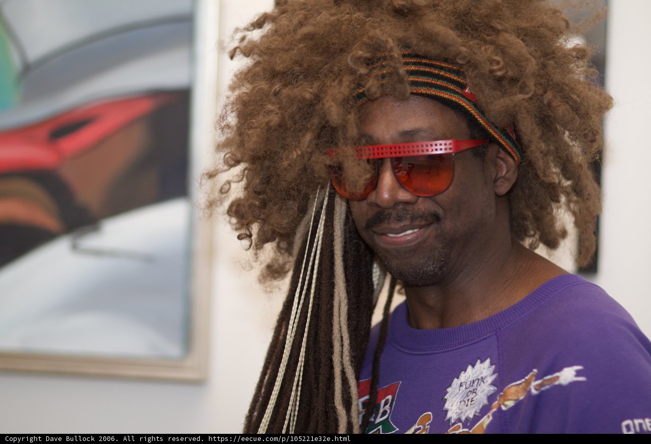 The Happy Man with Dreads and Sunglasses