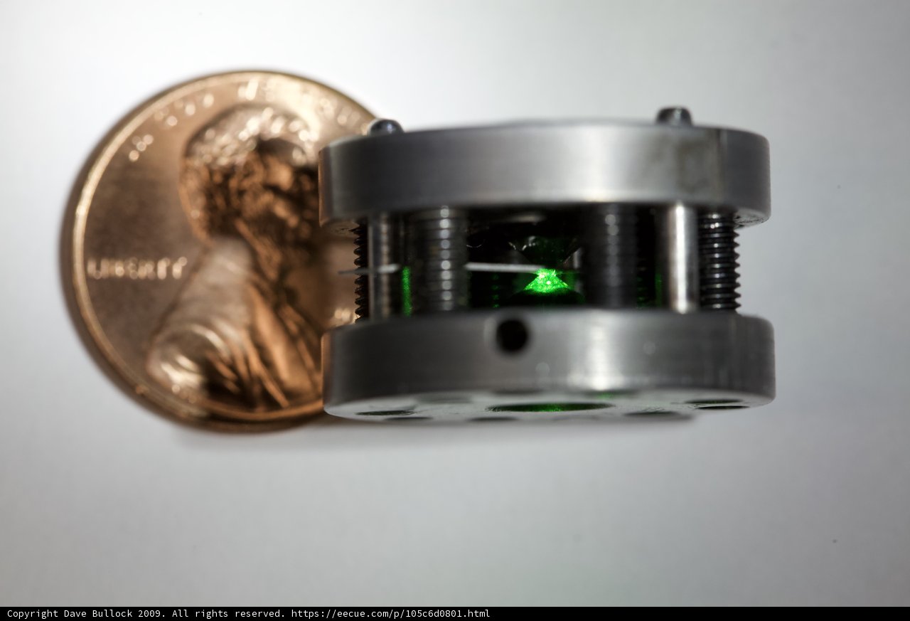 Mysterious Metal Gizmo with Glowing Green Lights