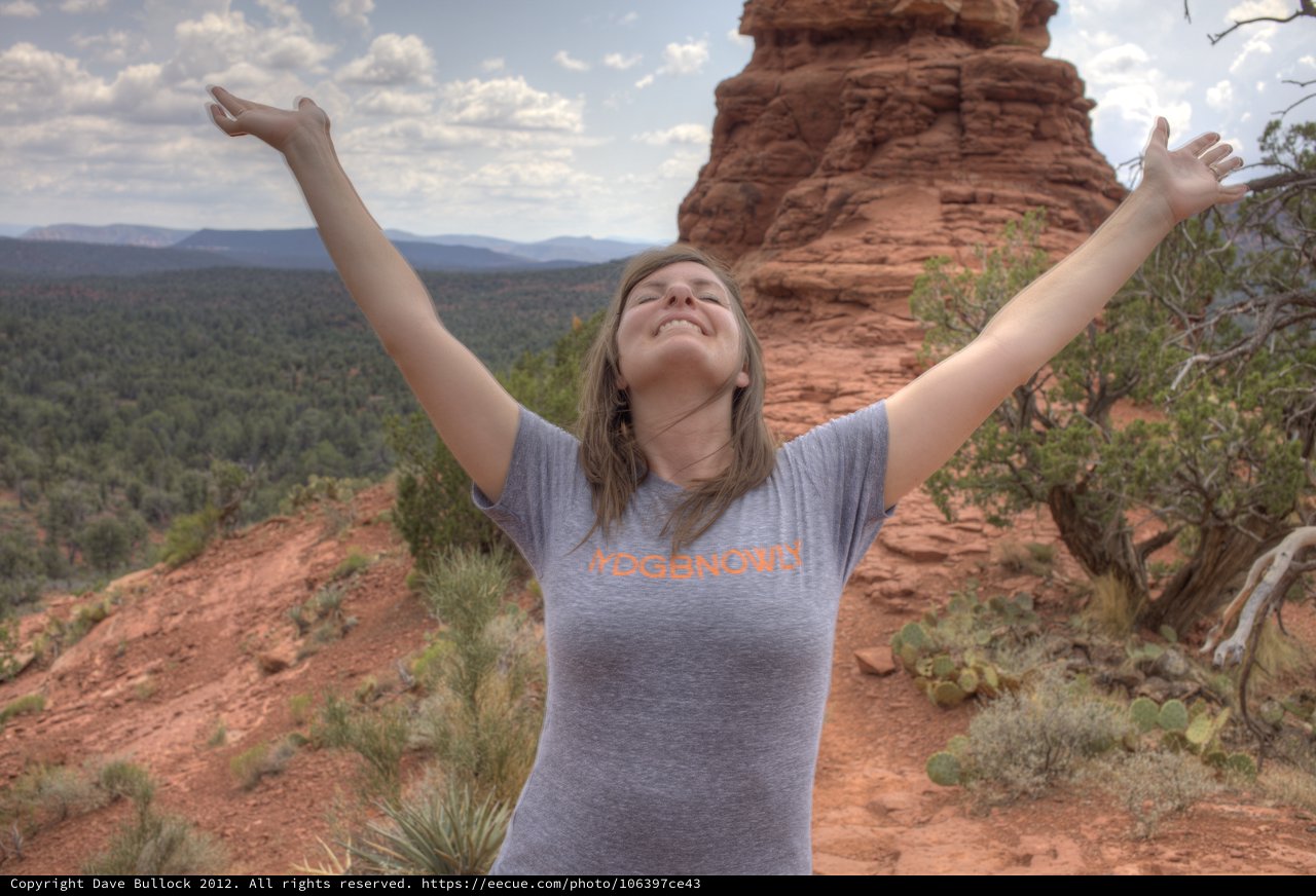 Joyful Woman Celebrating Atop Sedona Red Rock