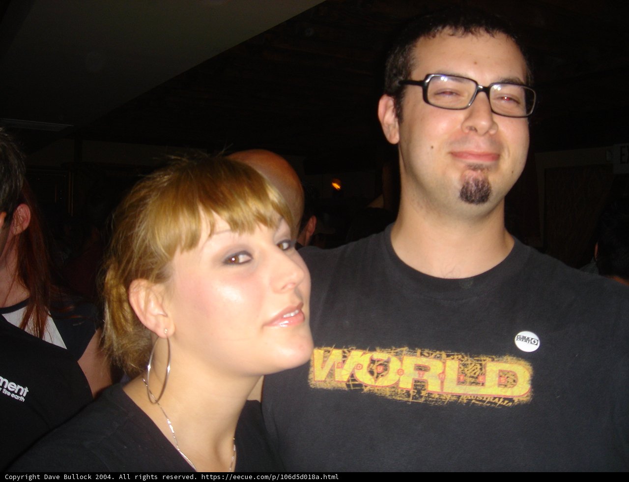 Black Shirted Man with Glasses