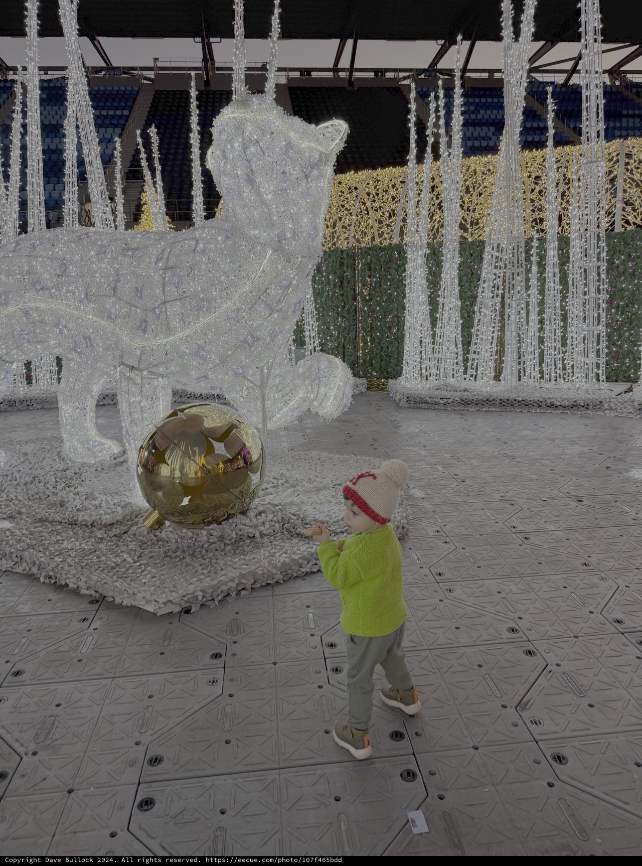 Child Explores Magical Winter Light Display