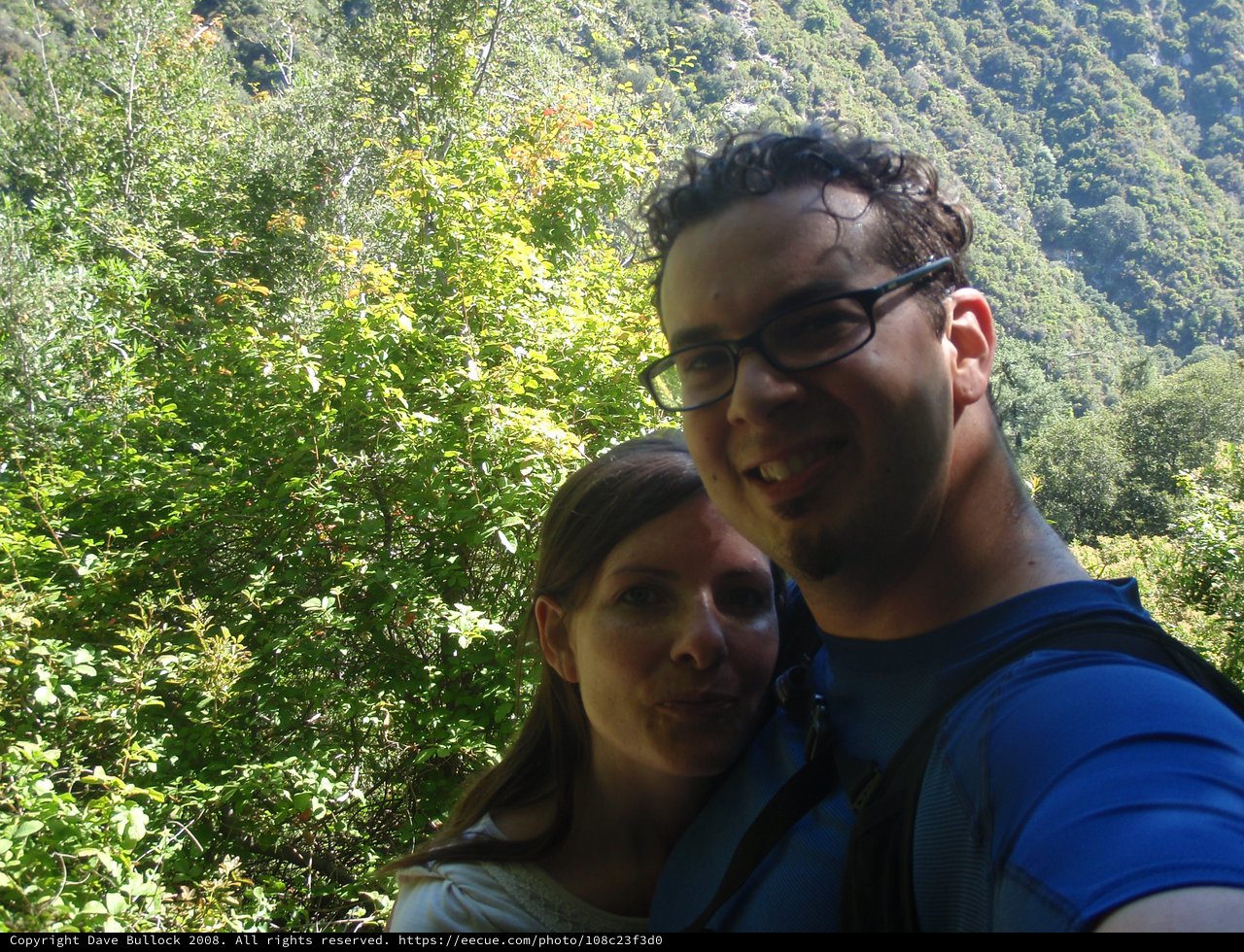 Couple Selfie Amid Lush Mountain Forest Trail