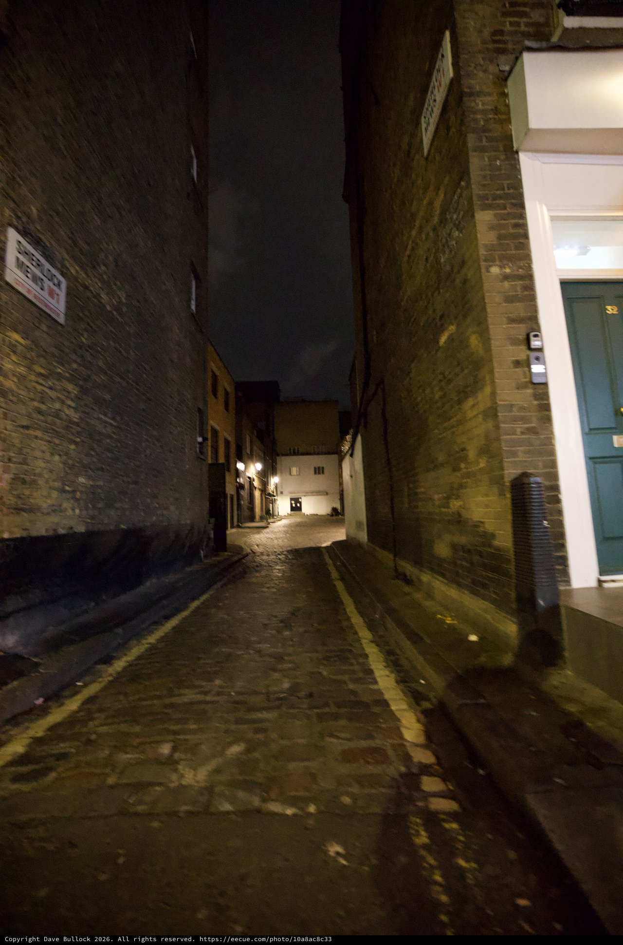 Atmospheric Night View of Narrow London Alleyway