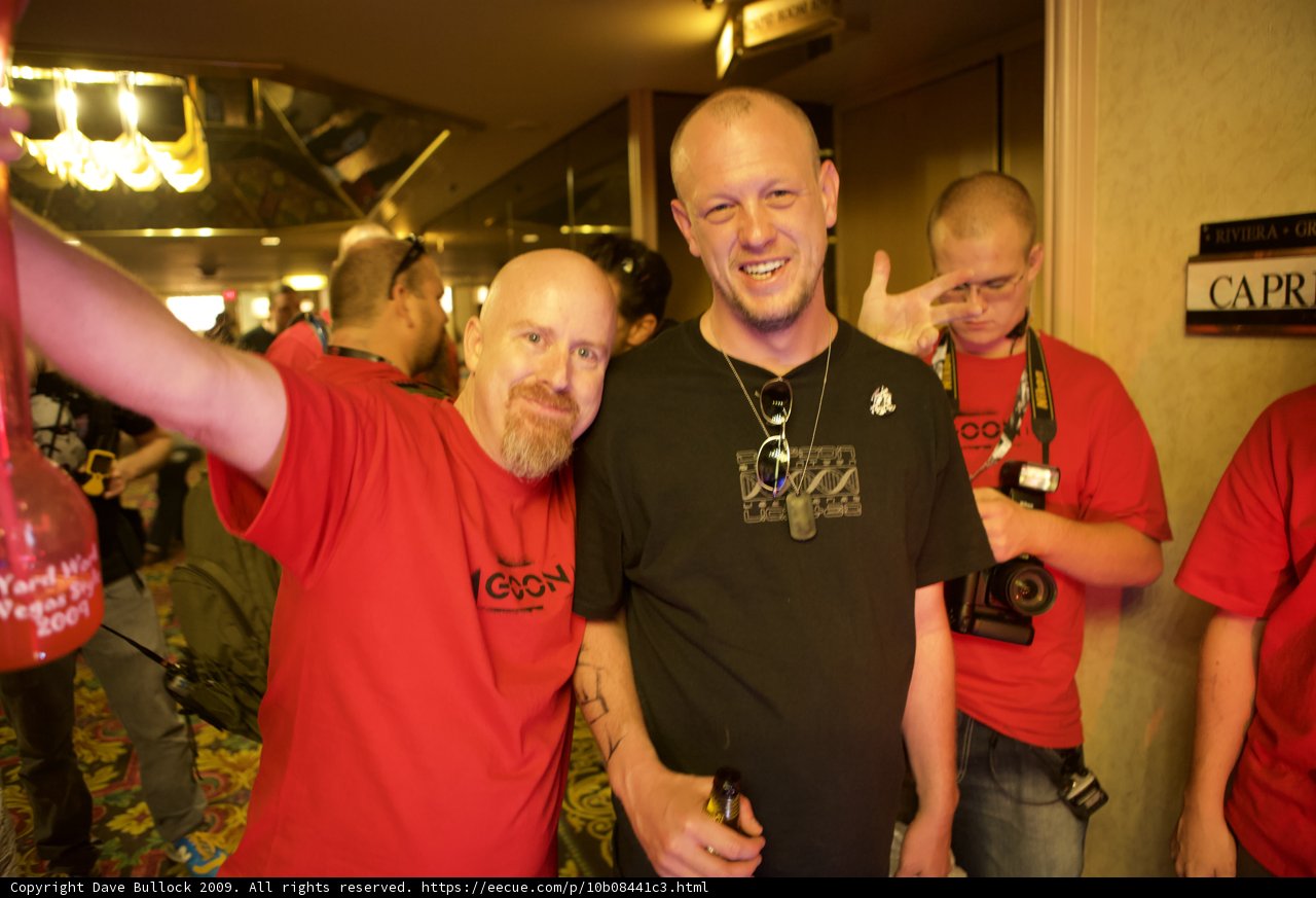 Red-Shirted Men Strike a Pose