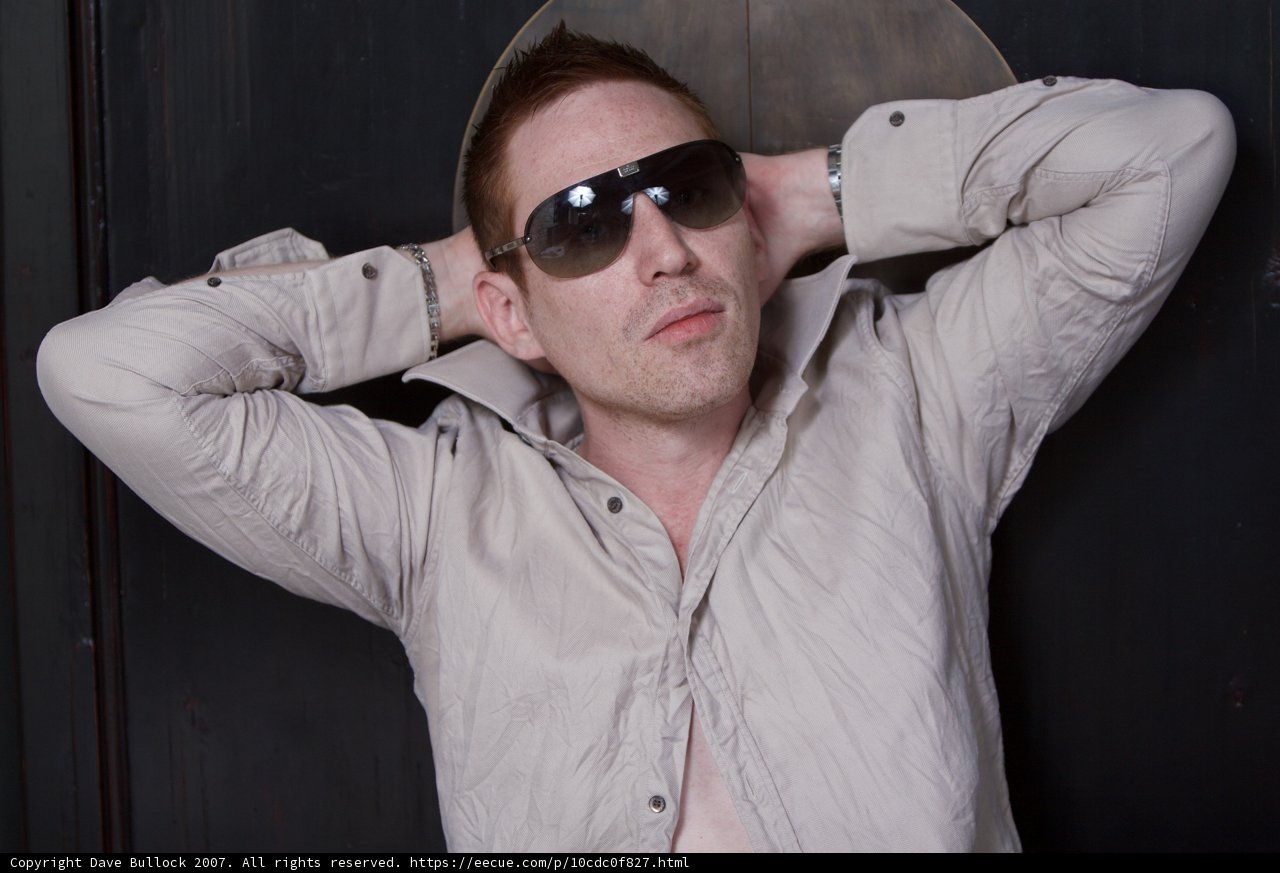 Stylish Man in Dress Shirt and Sunglasses
